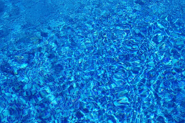 Textura de agua de piscina azul — Stockfoto