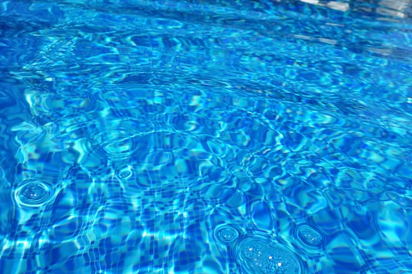 Textura azul da água da piscina — Fotografia de Stock