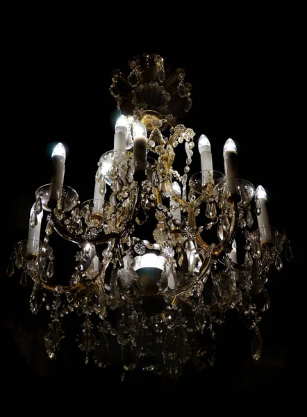 Crystal chandelier in the dark night — Stock Photo, Image