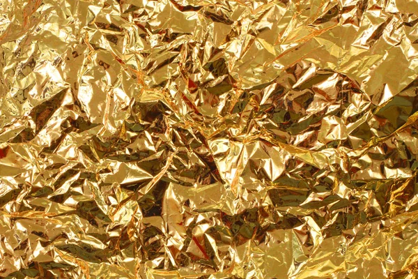 Golden tinfoil texture — 图库照片