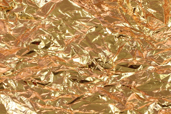 Golden tinfoil texture — Stockfoto