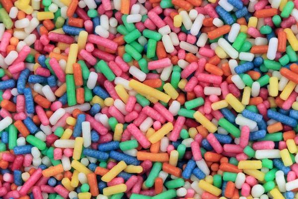 Color sugar rainbow decoration texture — Stock Photo, Image