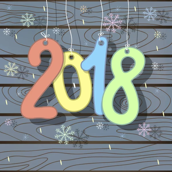 Rakamlar Noel kartı 2018 yeni yıl ile asılı parlak renkli ve gri düşen kar taneleri ahşap arka plan mavi.