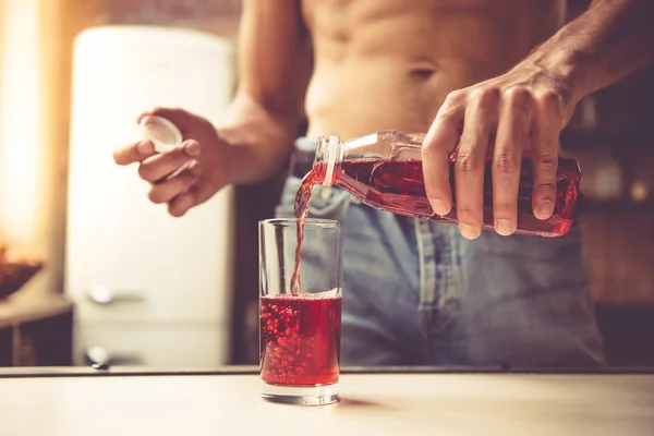 Sexy young man in kitchen — Stock Photo, Image