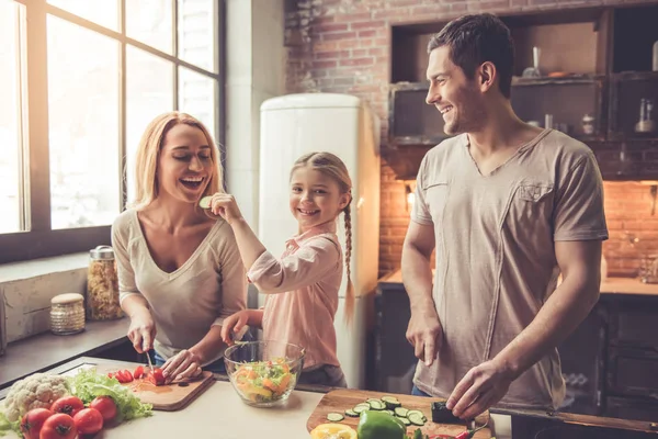 Young family cooking — Stock Photo, Image