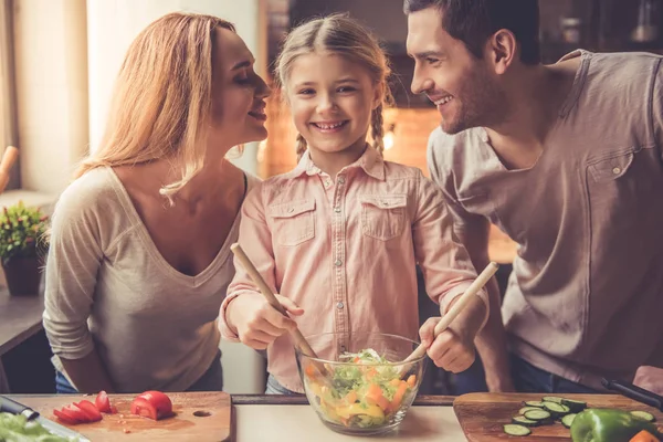 Young family cooking — Stock Photo, Image