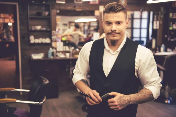 Attractive stylish barber