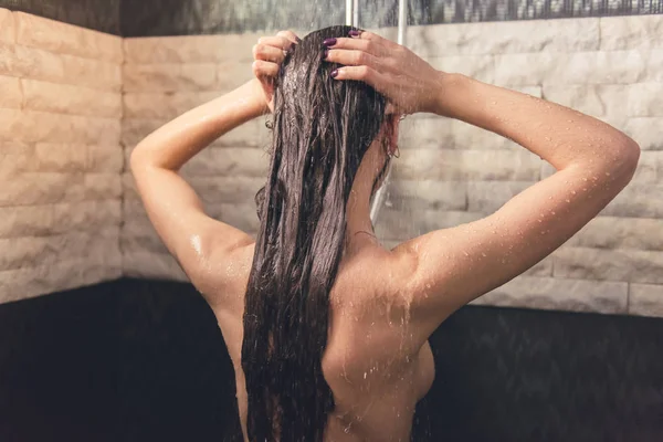 Girl taking shower — Stock Photo, Image