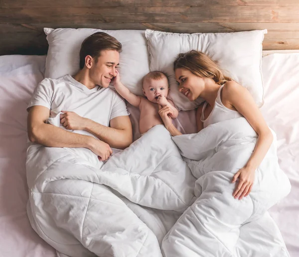 Young couple with baby — Stock Photo, Image