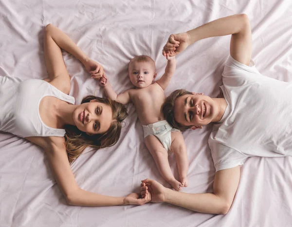 Young couple with baby — Stock Photo, Image