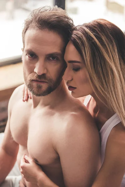 Beautiful couple in bed — Stock Photo, Image