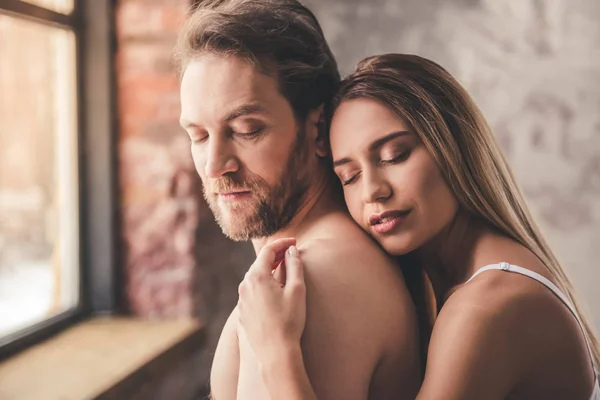 Beautiful couple in bed — Stock Photo, Image