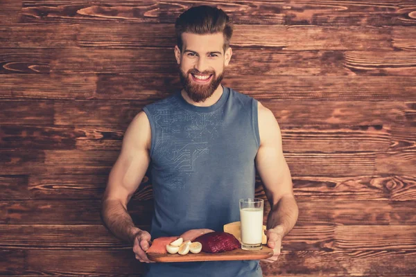 Hombre con comida saludable — Foto de Stock