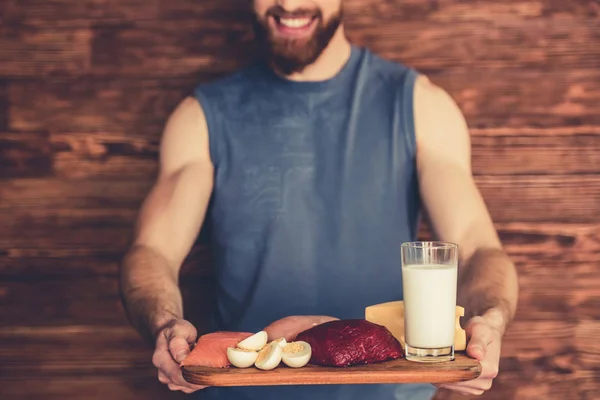 Hombre con comida saludable — Foto de Stock