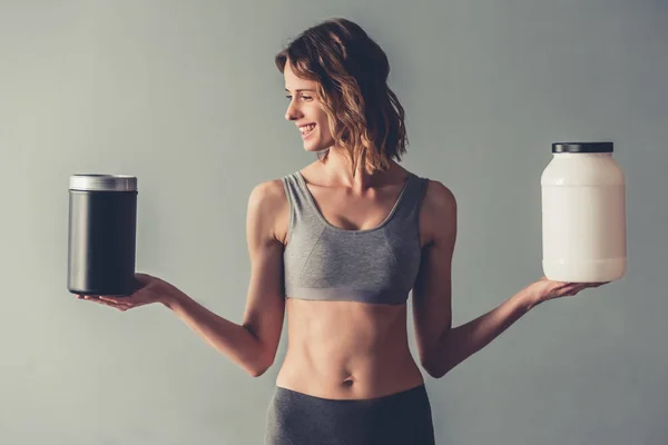 Mulher com nutrição esporte — Fotografia de Stock