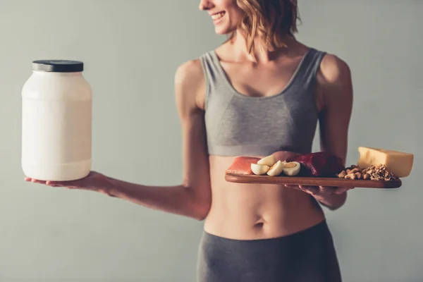 Frau mit Sporternährung — Stockfoto