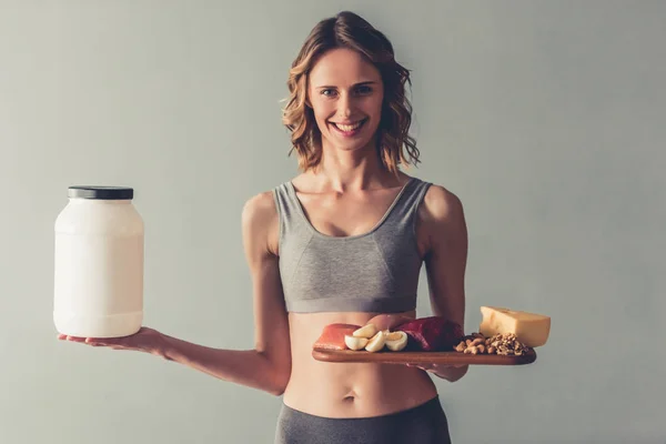 Mulher com nutrição esporte — Fotografia de Stock