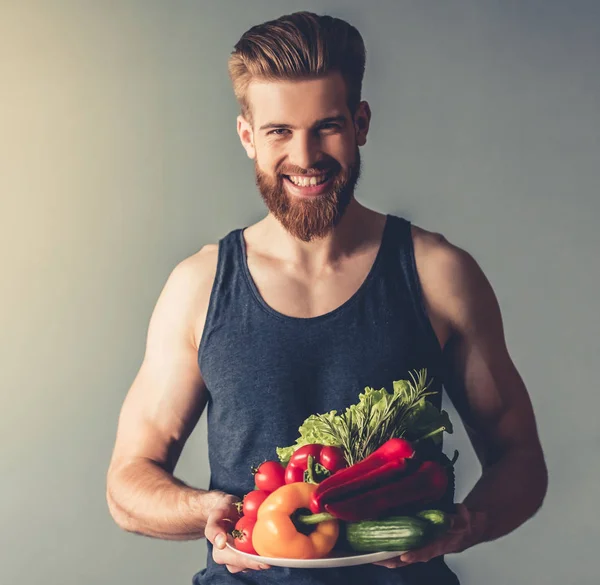 Hombre con comida saludable — Foto de Stock