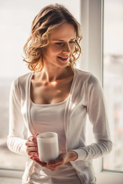 Beautiful woman at home — Stock Photo, Image