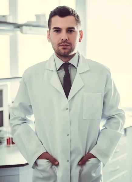 Handsome doctor in laboratory — Stock Photo, Image