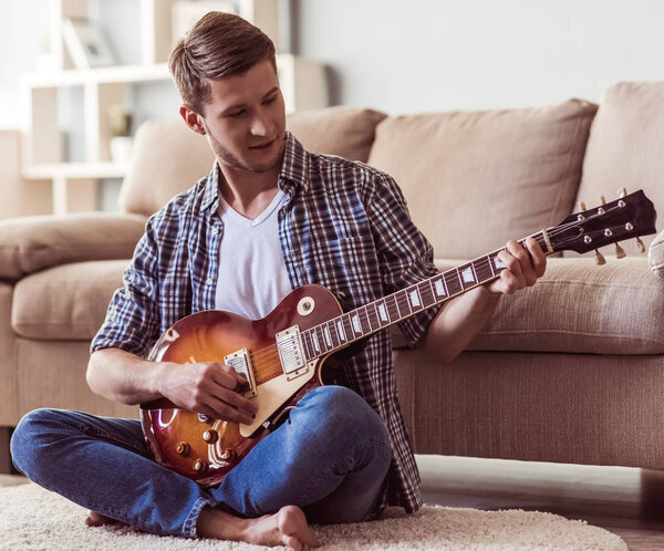 Handsome guy with guitar