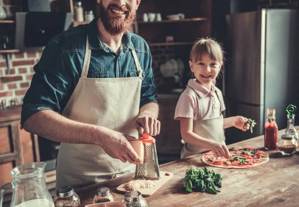 Dad and daughter cooking