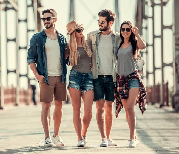 Young people walking outdoors — Stock Photo, Image