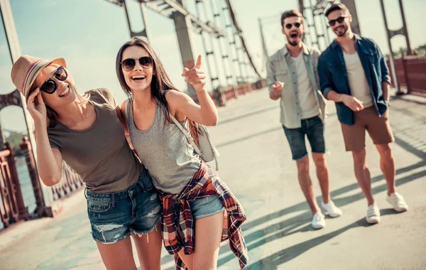 Young people walking outdoors — Stock Photo, Image