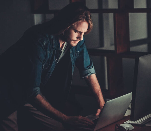 Guy working with computer