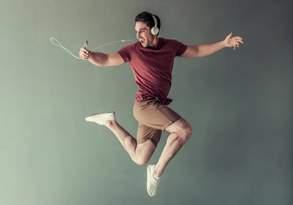 Bonito cara com gadget — Fotografia de Stock