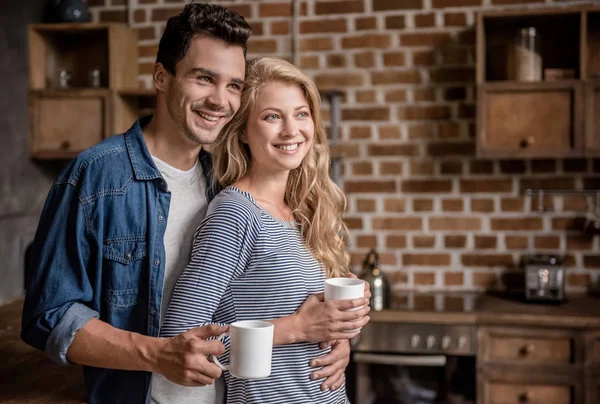 Couple in kitchen — Stock Photo, Image