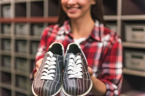 Girl with bowling shoes — Stock Photo, Image