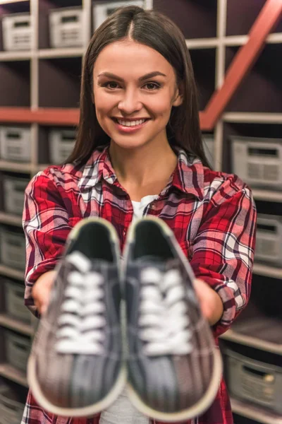 Girl with bowling shoes — Stock Photo, Image