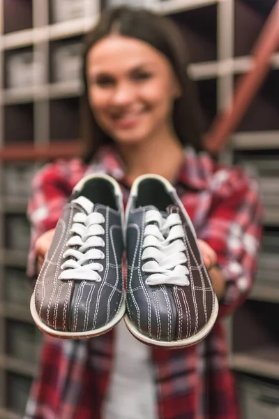 Girl with bowling shoes — Stock Photo, Image