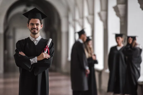 Happy young alumni — Stock Photo, Image