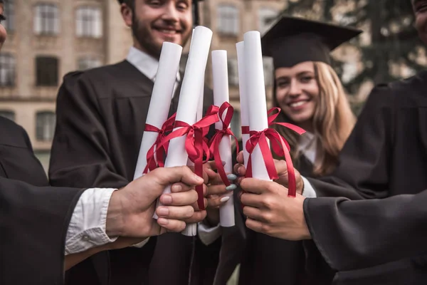 Happy young alumni — Stock Photo, Image