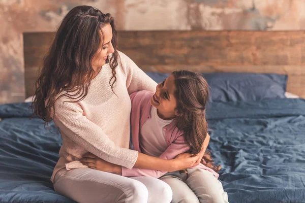 Mom and daughter at home