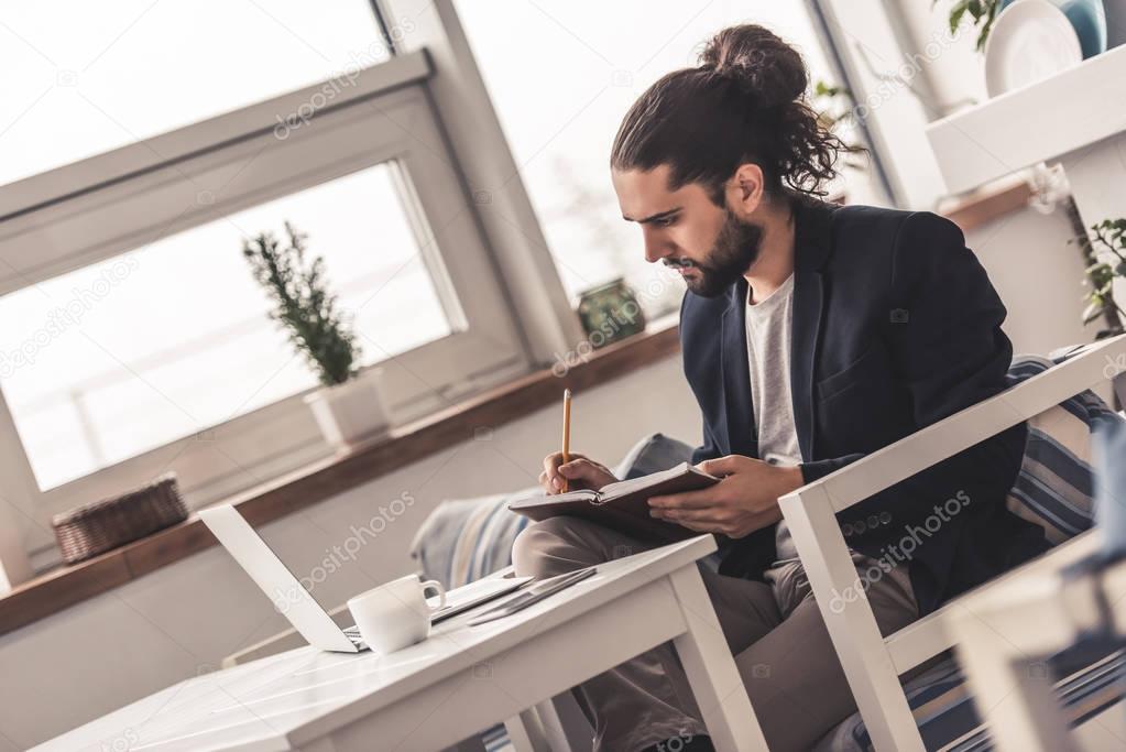 Stylish guy working