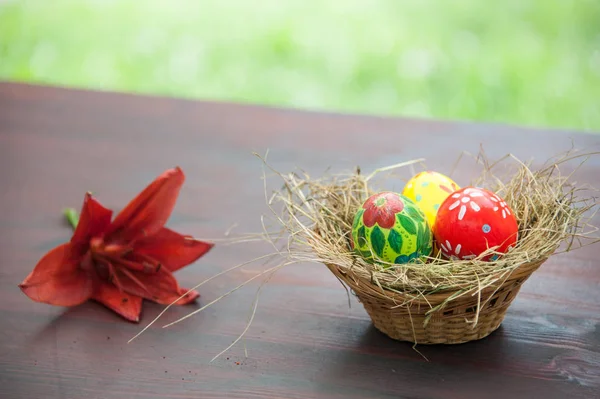 Basket with painted eggs Royalty Free Stock Images