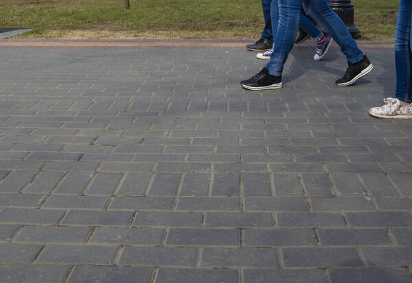 walking on city streets with shoes and athletic shoes