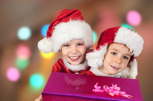 Happy Christmas children with gifts — Stock Photo, Image