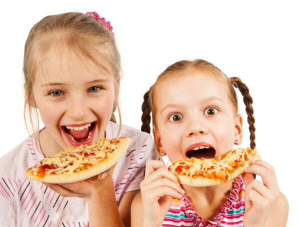 Happy kids eating pizza
