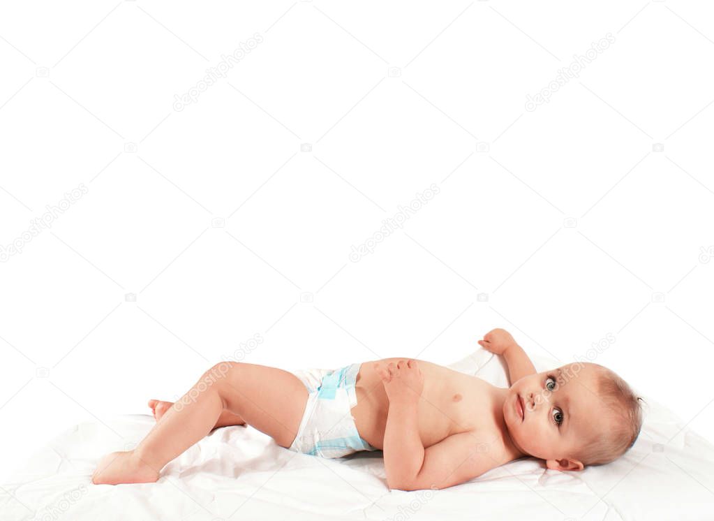 Cute happy baby boy in diaper 