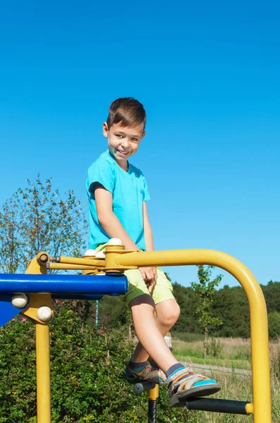 Boy playing on the playground — Stock Photo, Image
