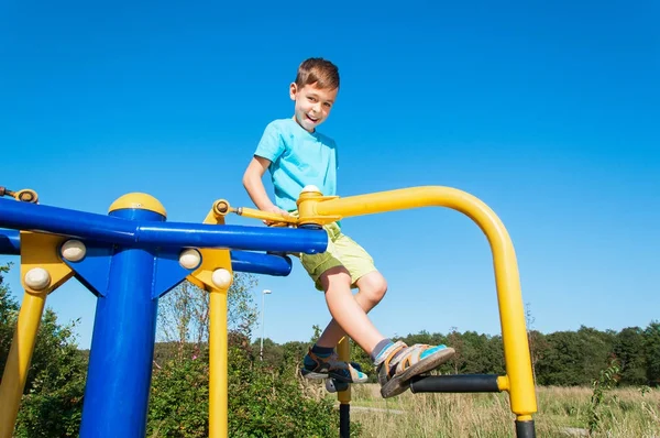Boy playing on the playground — Stock Photo, Image