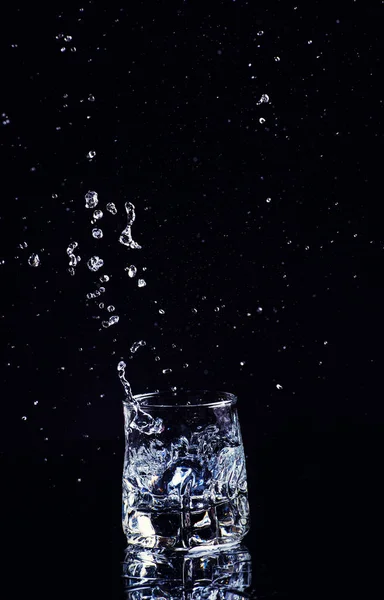 Isolated Cold Water Glass Splash Cubes Ice Black Background Brandy — Stock Photo, Image