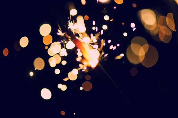 Glowing Sparks in the dark — Stock Photo, Image