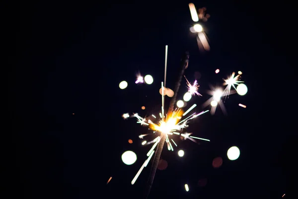 Sparks in the dark. Sparks. Christmas and New Year time. Magic l — 스톡 사진