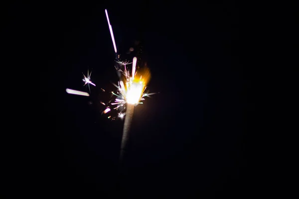 Sparks in the dark. Sparks. Christmas and New Year time. Magic l — Stockfoto