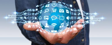 Dijital dünya ile web simgeleri kullanarak iş adamı